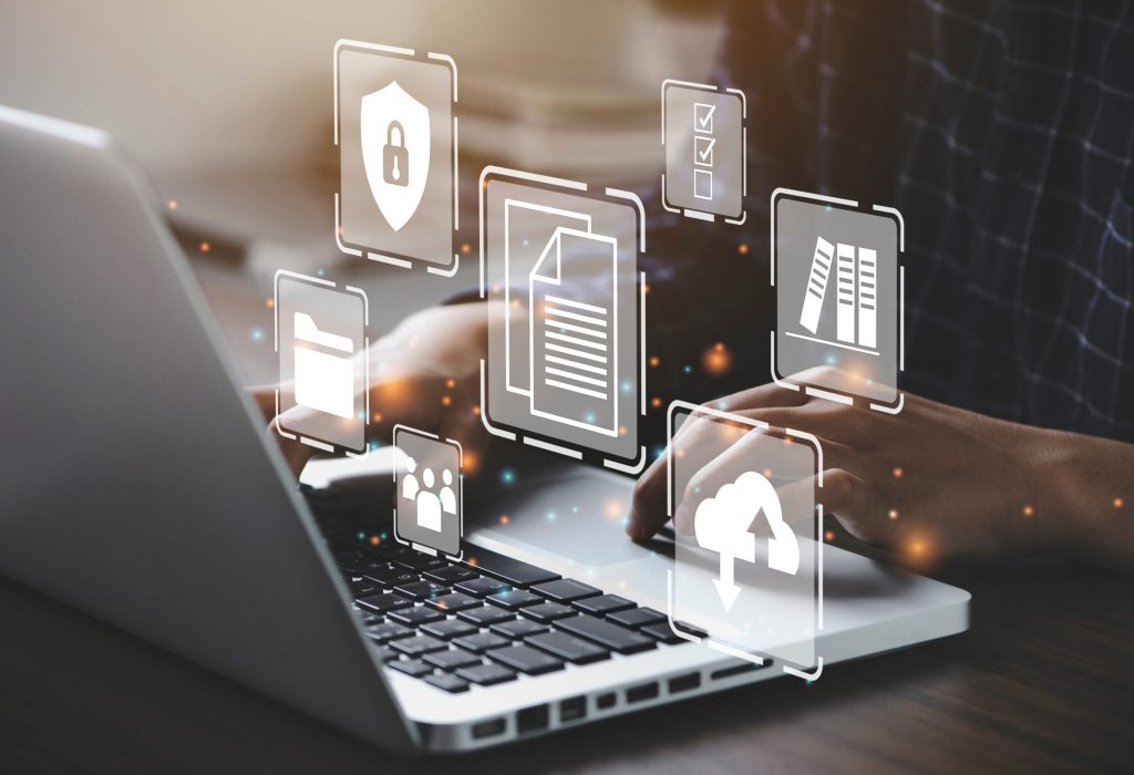 Businessman,Using,A,Computer,To,Document,Management,Concept,,Online,Documentation Businessman,Using,A,Computer,To,Document,Management,Concept,,Online,Documentation